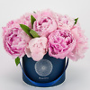 Blue flower box with pink peonies