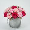 Preserved roses in a gray box