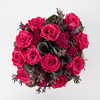 Arrangement with preserved roses and foliage