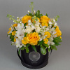 Black flower box with yellow roses flower delivery service in Vilnius Beatričės Gėlių Namai