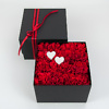 Black flower box with carnations