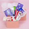 A set of sweets in a pink gift box