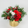 Winter bouquet in a golden pot